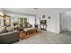 Spacious living room featuring comfortable sofas and large windows at 45 San Jose Dr, Ormond Beach, FL 32176