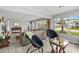 Open living space with comfortable seating and tiled floors at 45 San Jose Dr, Ormond Beach, FL 32176