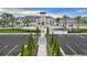Stunning exterior of the clubhouse, highlighting its architecture and professionally landscaped entrance at 1128 Kilkenny Ln, Ormond Beach, FL 32174
