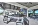 Inviting outdoor lounge featuring tv, comfortable seating and golf course views at 1128 Kilkenny Ln, Ormond Beach, FL 32174