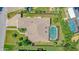 Aerial view showing a pool, backyard, driveway, and roof at 3 Seabridge Dr, Ormond Beach, FL 32176