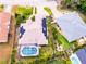 Aerial view of the home, highlighting the pool and solar panels at 3 Seabridge Dr, Ormond Beach, FL 32176