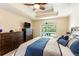 Main bedroom with pool view, dresser, and king-size bed at 3 Seabridge Dr, Ormond Beach, FL 32176