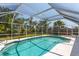 Inviting screened pool with ample space for lounging at 3 Seabridge Dr, Ormond Beach, FL 32176