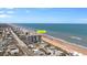 Aerial view of a beachfront condo building, offering stunning ocean views and a desirable coastal lifestyle at 1239 Ocean Shore Blvd # 7E5, Ormond Beach, FL 32176