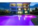 Stunning multi-story home with a beautifully lit pool area, perfect for evening relaxation and entertaining at 4711 S Atlantic Ave, Ponce Inlet, FL 32127