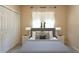 Cozy bedroom with neutral tones, closet, carpet, and natural light from the window at 5701 John Anderson Hwy, Flagler Beach, FL 32136