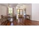 Inviting dining area with hardwood floors, stylish furniture, and plenty of natural light at 5701 John Anderson Hwy, Flagler Beach, FL 32136
