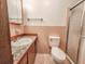 Clean bathroom with tiled walls and a mosaic countertop at 1119 Indigo Rd, Ormond Beach, FL 32174