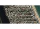 Birds eye view of a residential area of identical homes in close proximity to a beautiful beach at 10 Juniper Dr, Ormond Beach, FL 32176