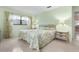 Charming bedroom with a large window and classic decor at 10 Juniper Dr, Ormond Beach, FL 32176
