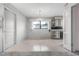 Bright dining area with a chandelier and adjacent built-in kitchen cabinets at 10 Juniper Dr, Ormond Beach, FL 32176