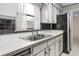 Bright kitchen featuring stainless steel appliances and a double sink at 10 Juniper Dr, Ormond Beach, FL 32176
