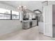 Open kitchen concept featuring classic detailing and bright lighting at 10 Juniper Dr, Ormond Beach, FL 32176
