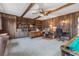 Home office featuring built-in shelves, wooden paneling, and dual workspace at 10 Juniper Dr, Ormond Beach, FL 32176