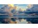 Beautiful beach with gold and gray storm clouds reflecting in the wet sand at 64 Ocean Palm S Dr # 64, Flagler Beach, FL 32136