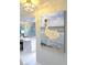 Interior showcasing a painting of a Personal by the sea and a kitchen island at 64 Ocean Palm S Dr # 64, Flagler Beach, FL 32136