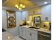 Bright kitchen with white cabinetry, granite countertops, tile backsplash, and stainless steel appliances at 64 Ocean Palm S Dr # 64, Flagler Beach, FL 32136