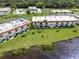 Waterfront condos feature manicured lawn, balconies, and community amenities, offering serene living at 50 Ocean Palm Villa S, Flagler Beach, FL 32136