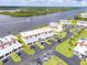 Expansive aerial view showcases the complex and its proximity to the serene river at 50 Ocean Palm Villa S, Flagler Beach, FL 32136