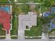 Overhead view of the house, highlighting its roofline and yard at 928 George Hecker Dr, South Daytona, FL 32119
