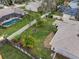 Aerial view of house and backyard, showing surrounding homes at 928 George Hecker Dr, South Daytona, FL 32119