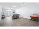 Bright living room featuring hardwood floors, neutral color palette and access to balcony at 280 Celebration Blvd # 203, Celebration, FL 34747