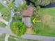 Aerial view of property showing roof, driveway, and landscaping at 100 Longspur Ct, Daytona Beach, FL 32119