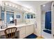 Bathroom featuring a vanity with lots of storage and a separate shower/tub area at 100 Longspur Ct, Daytona Beach, FL 32119
