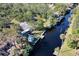 Aerial view of property, highlighting canal-front access and surroundings at 1069 Indigo Rd, Ormond Beach, FL 32174