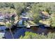 Aerial view showing home, dock, and canal at 1069 Indigo Rd, Ormond Beach, FL 32174