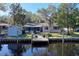 Charming home with a spacious backyard, private dock, and shed at 1069 Indigo Rd, Ormond Beach, FL 32174