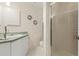 Small bathroom with shower/tub combo and updated vanity at 1069 Indigo Rd, Ormond Beach, FL 32174