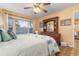 King-size bed, dresser, and relaxing water views from this bedroom at 1069 Indigo Rd, Ormond Beach, FL 32174