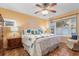 Spacious bedroom with a king-size bed and water view at 1069 Indigo Rd, Ormond Beach, FL 32174