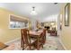 Dining room with view into living room and fireplace at 1069 Indigo Rd, Ormond Beach, FL 32174