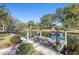 Wooden dock with scenic canal views at 1069 Indigo Rd, Ormond Beach, FL 32174