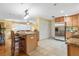 Stainless steel appliances and granite countertops highlight this kitchen at 1069 Indigo Rd, Ormond Beach, FL 32174