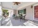 Relaxing covered porch with wicker furniture at 1069 Indigo Rd, Ormond Beach, FL 32174