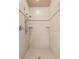 Large walk-in shower with tiled walls at 1069 Indigo Rd, Ormond Beach, FL 32174