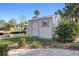 Gray storage shed with a window and paver walkway at 1069 Indigo Rd, Ormond Beach, FL 32174