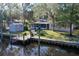 Lovely canal-front home with private dock and lush landscaping at 1069 Indigo Rd, Ormond Beach, FL 32174