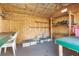 Interior view of a well-organized workshop with shelves and workbenches at 1069 Indigo Rd, Ormond Beach, FL 32174
