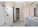 Elegant bathroom with double vanity and shower at 1281 Champions Dr, Daytona Beach, FL 32124