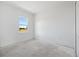 Bright bedroom with large window and view of open space at 1281 Champions Dr, Daytona Beach, FL 32124