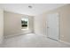 Well-lit bedroom with a window and closet at 1281 Champions Dr, Daytona Beach, FL 32124