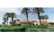 Elegant clubhouse entrance with landscaping at 1281 Champions Dr, Daytona Beach, FL 32124