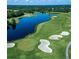 Picturesque golf course with a large lake at 1281 Champions Dr, Daytona Beach, FL 32124