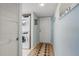 Hallway entrance features a stackable washer and dryer at 2294 Ocean Shore Blvd # 1020, Ormond Beach, FL 32176