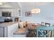 Charming dining area with built-in bench seating and a rustic wooden table at 10 Ocean Palm Villa S # 10, Flagler Beach, FL 32136